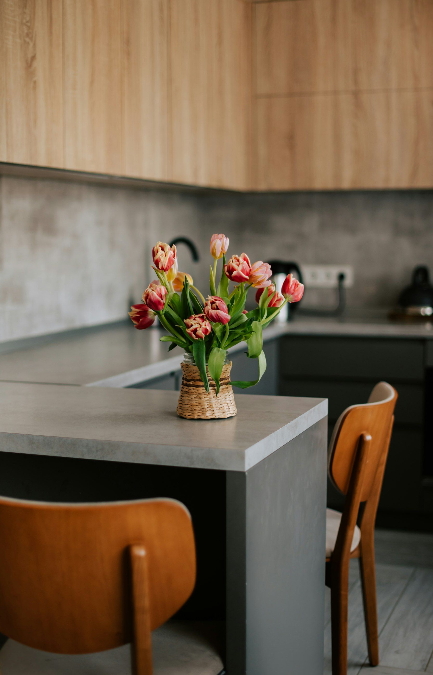 Fresh tulips on a clean kitchen counter